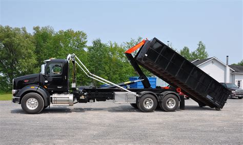 Ampliroll hooklift trucks for sale in Wisconsin & Illinois | RNOW Inc