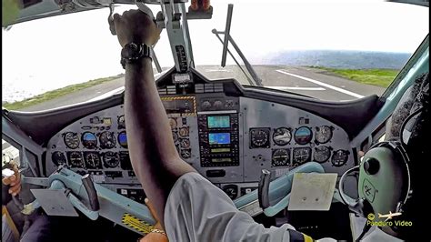 Winair Flight Saba to St Maarten Cockpit view Amazing Takeoff and Landing - YouTube