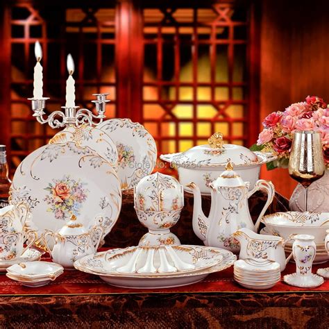 Free shipping 70 piece European luxury handmade relief dinnerware suit gilt embossed porcelain ...