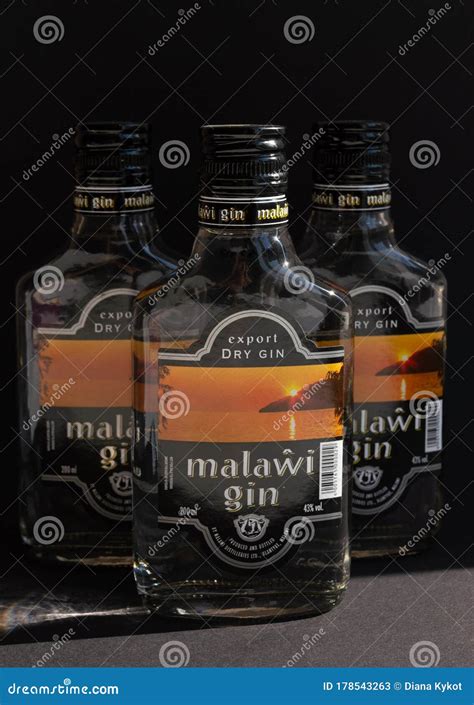 KYIV, UKRAINE - APRIL 03, 2020: Vertical Photo of Three 200 Ml Glass Bottles of Malawi Gin ...