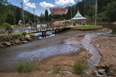 Water levels plummet in Green Mountain Falls lake after outlet breach ...