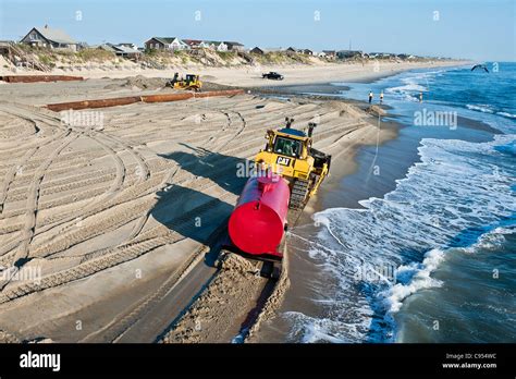 Rebuilding eroded beaches, Nags Head, Outer Banks, North Carolina, USA Stock Photo - Alamy