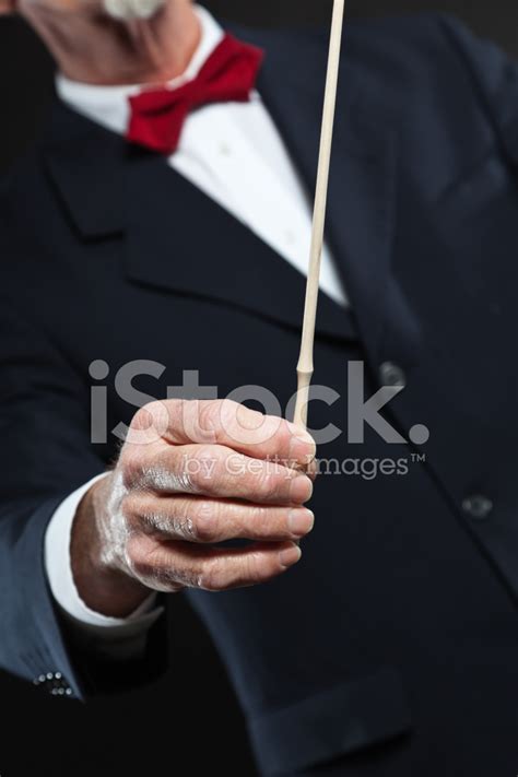 Conductor Conducting An Orchestra Isolated. Stock Photo | Royalty-Free ...