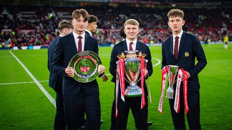 Under-18s with trophies at half-time in Man Utd v Newcastle | Manchester United