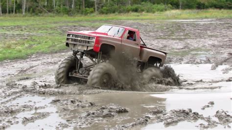 Red Chevy Mega Truck Mudding At Country Compound Mud Bog - YouTube