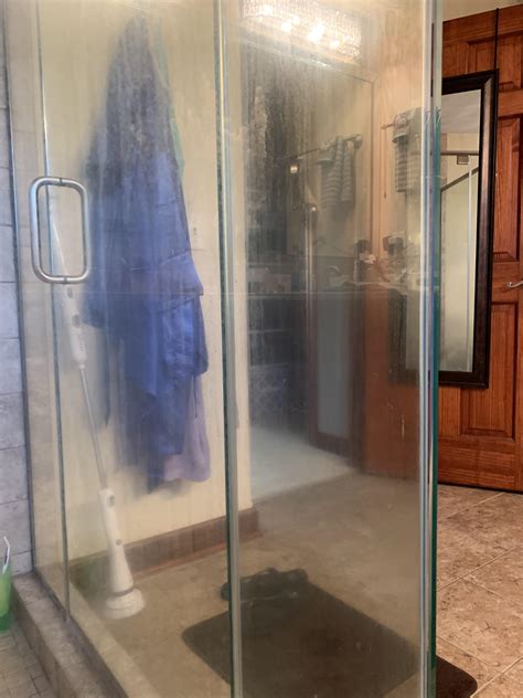 Need help! Hard water stains (?) on my shower glass door. Tried literally everything people ...