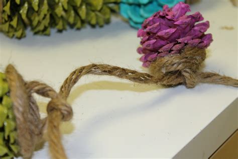 Gleeful Peacock: Painted Pine Cone Garland DIY