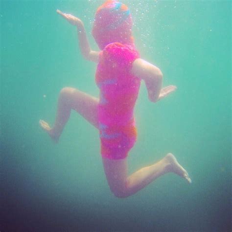 Surreal Photos of People Swimming Underwater in Olek's Crocheted Bodysuits