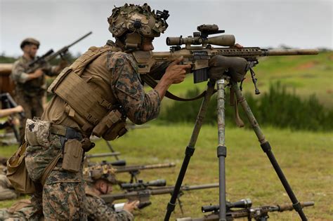 U.S. Marine Corps Scout Sniper uses an M110 during Expeditionary ...