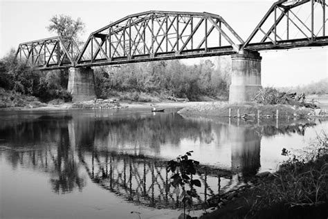 Canoe, Fisherman and Railroad Bridge over Brazos River, Br… | Flickr