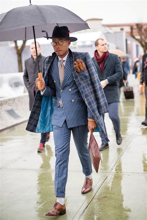 Modern Dandyism. The tailored suit styled with a jacket over the ...