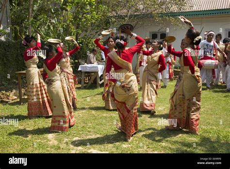 Assamese girls performing Bihu assamese folk dance in traditional ...