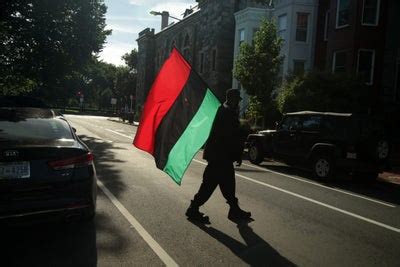 A Timeline Of Black American Flags Throughout History - Essence - Beautifaire