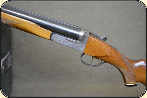 Z Sold 10ga. Dickson Falcon 3200 double barreled shotgun.