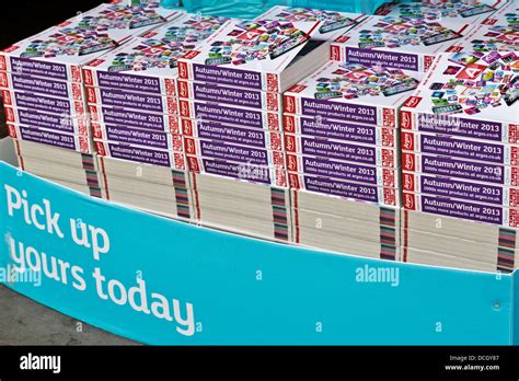 Stacks of Argos catalogues outside Argos store in St Neots, Cambridgeshire, England Stock Photo ...