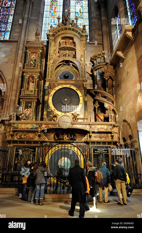 Visitors, astronomical clock, interior view of Strasbourg Cathedral ...