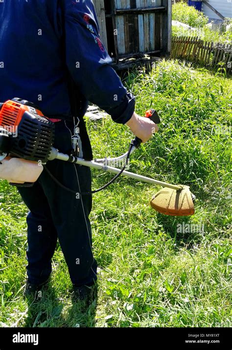 Manual hand grass cutter hi-res stock photography and images - Alamy