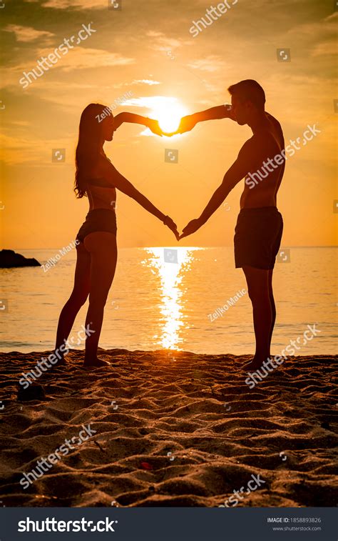 Romantic Couple Silhouette On Beach Sunrise Stock Photo 1858893826 ...