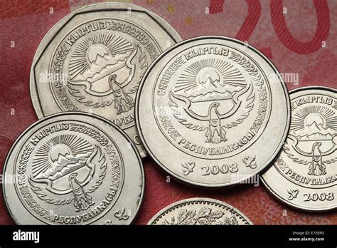 Coins of Kyrgyzstan. National emblem of Kyrgyzstan depicted in Kyrgyzstani som coins Stock Photo ...