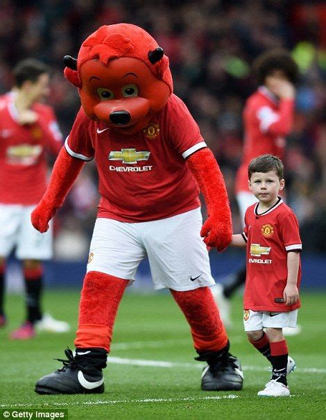 Kai Rooney joins Fred the Red as United's mascot for the day ...