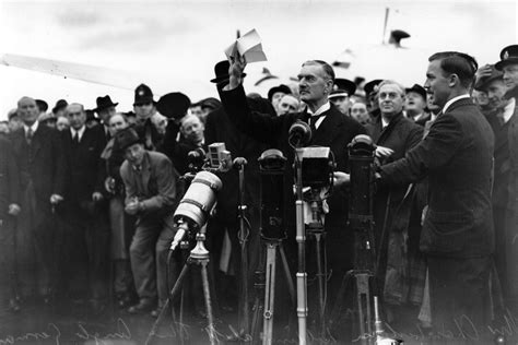 I'm British. America's weird obsession with Neville Chamberlain baffles me. - Vox