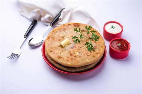 Aloo Gobi Paratha 16584705 Stock Photo at Vecteezy