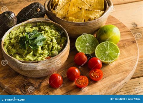 Guacamole Dip in Bowl with Tortilla Chips and Ingredients Stock Image - Image of dips, nachos ...