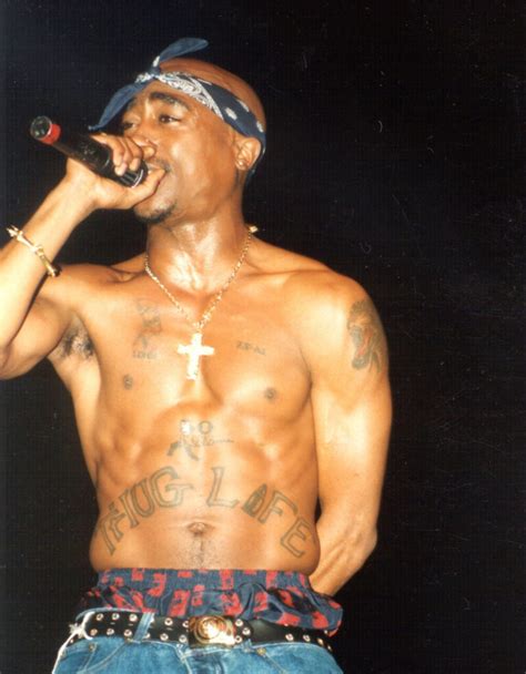 Decrypt The Meaning Of Tupac Shakur's Most Iconic Tattoos – Film Daily - Tattoo News