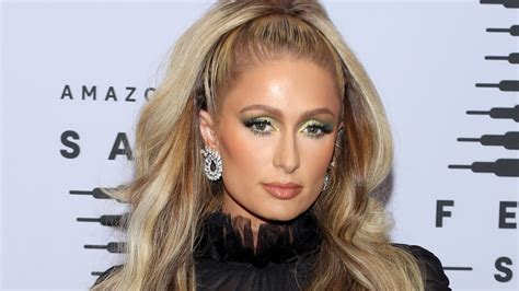 Paris Hilton Gets Apology from Artist Who Photoshopped Viral 'Stop Being Poor' Tank Top Pic