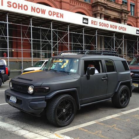 Love the matte black color of this #Toyota FJ Cruiser in SoHo, NYC. Lifted Chevy Trucks, Suv ...