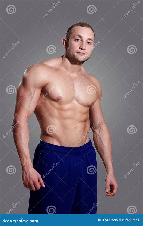 Bodybuilding. Man and His Powerful Body Stock Image - Image of powerful ...