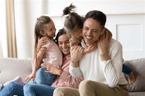 Overjoyed Little Children Playing with Happy Parents. Stock Photo ...