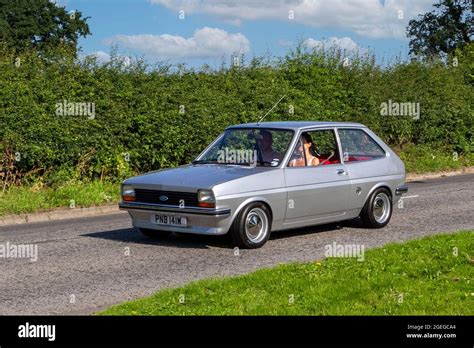 A front view of 1981 1980s 80s Petrol Silver Ford Fiesta L Hatchback vintage classic car retro ...