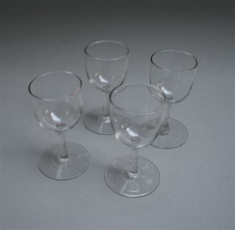 A set of four glass sherry glasses - Williams Antiques