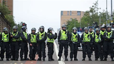 Scottish police officers take action in pay dispute - BBC News