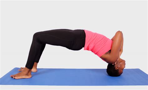 Fit Woman Doing Neck Bridge Yoga Pose