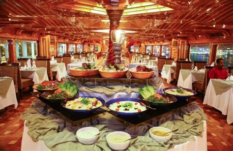 Dubai Creek Cruise Dinner: Cruising, drinks, Lavish Buffet | GetYourGuide