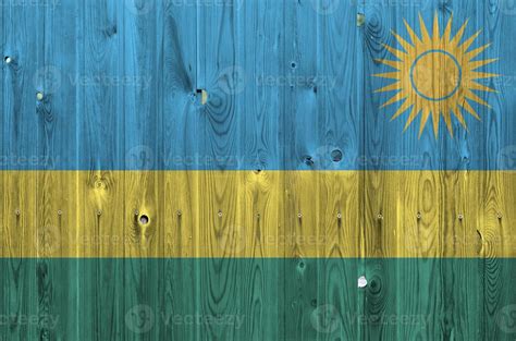 Rwanda flag depicted in bright paint colors on old wooden wall ...