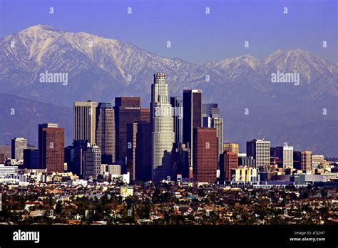 los angeles skyline and snow covered San Bernardino mountains Stock ...