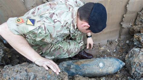 Army works to defuse unexploded WWII bomb near Wembley Stadium - ITV News