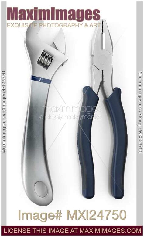 Photo of Adjustable Wrench and Pliers | Stock Image MXI24750