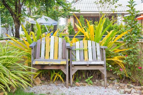 Old Wooden Chairs in Garden Stock Photo - Image of tree, outdoor: 45812598