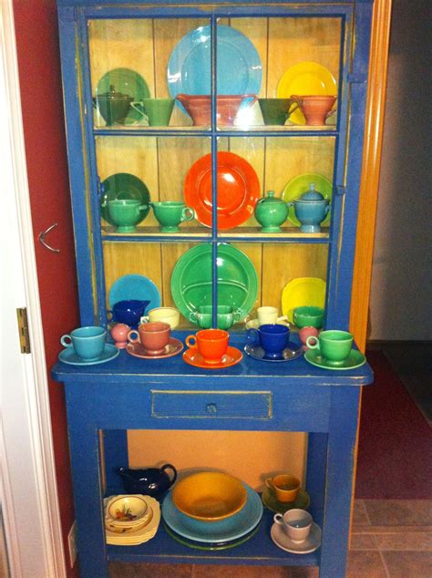 Fiestaware cabinet. Wow! I have to learn how to post some of my pictures to interest ...