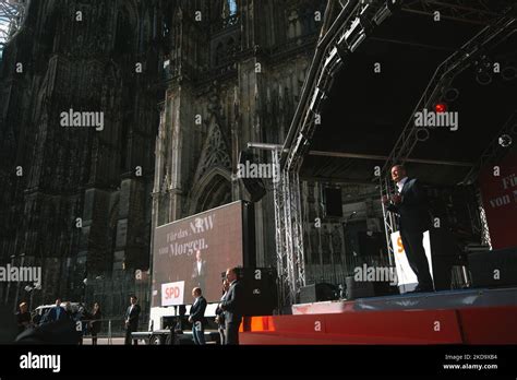 Olaf Scholz, Chancellor of Germany, speaks to the crowd on the stage at ...