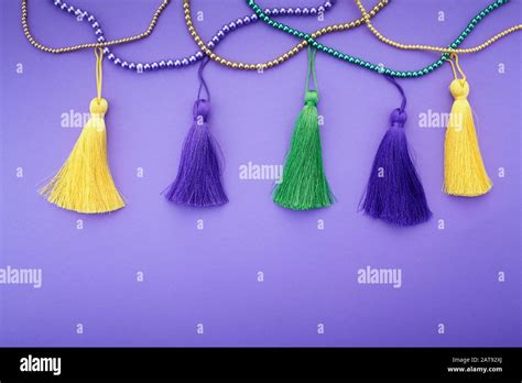 Mardi Gras decoration on purple background. Flat lay Stock Photo - Alamy