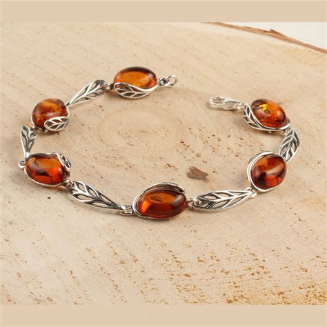 Honey Baltic Amber Sterling Silver Bracelet With Leaf Edged Design