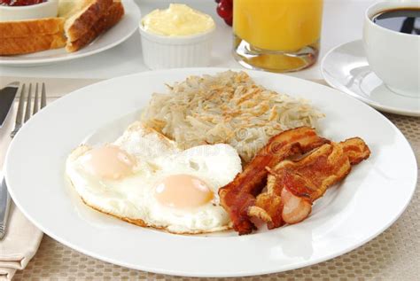 Bacon Eggs and Hash Browns stock image. Image of easy - 17052309