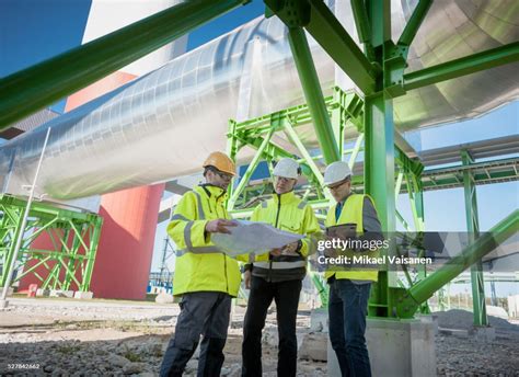 Engineers On Modern Power Station Construction Site High-Res Stock ...