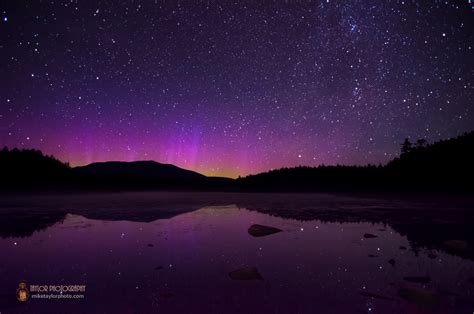 Northern Lights Surround Mountain in Stunning Photo | Space