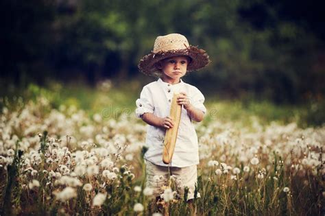 Funny Funny Little Boy in a Straw Hat Stock Image - Image of adorable, park: 107856463